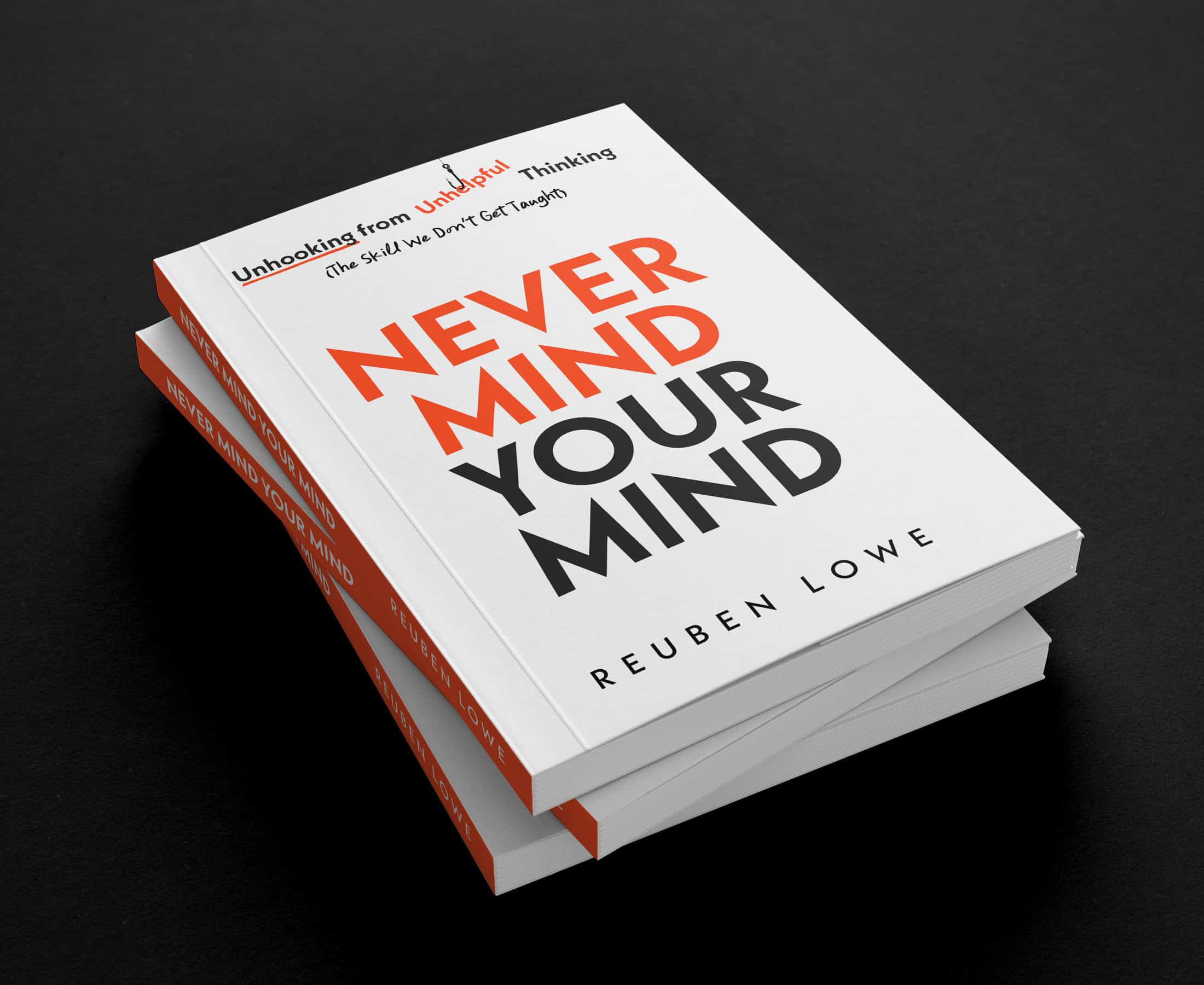 Two copies of the paperback Never Mind Your Mind by Reuben Lowe, stacked, showing the front cover and orange spine.